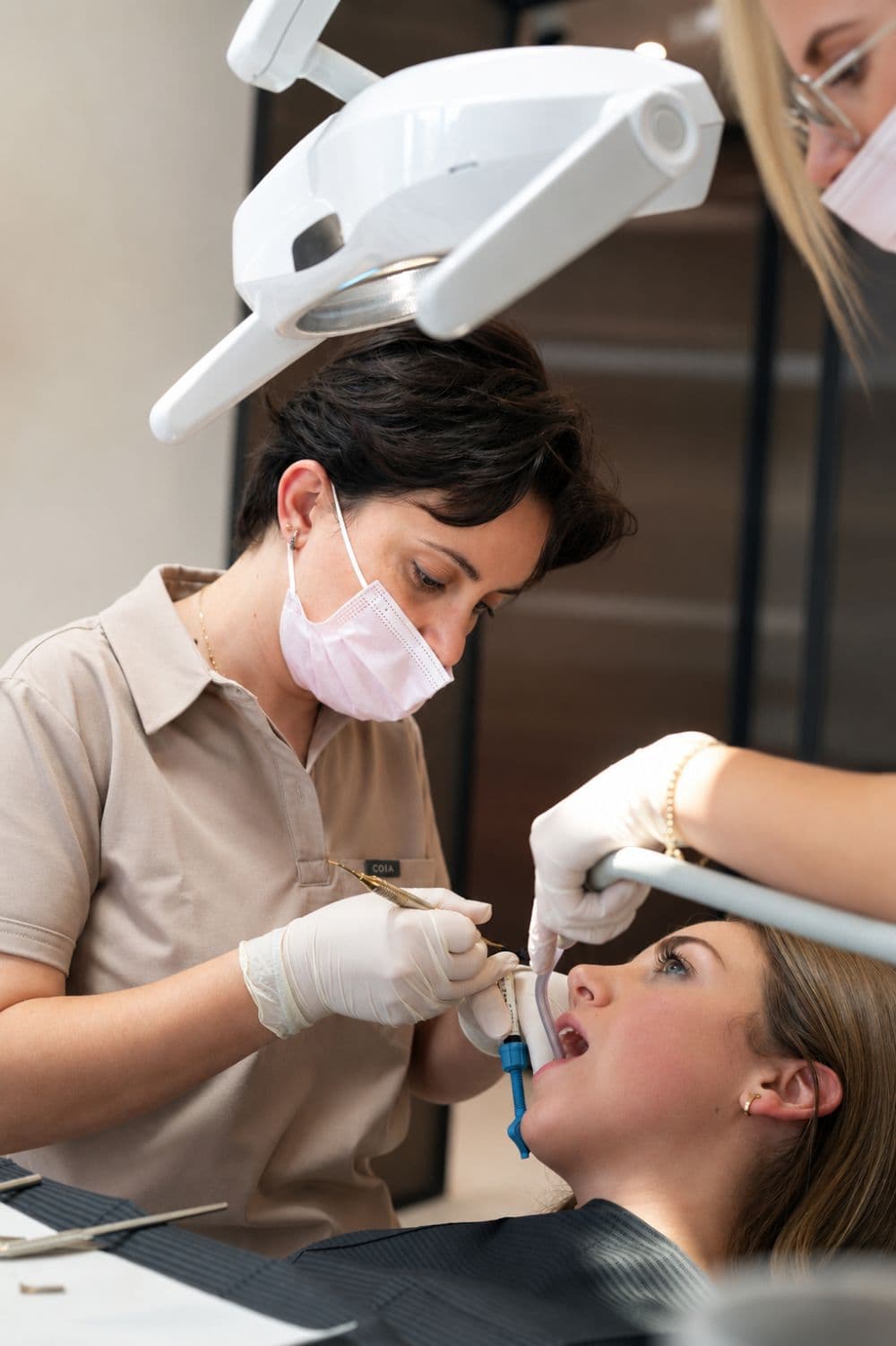 Dr. Emanuela Selfo providing dental care in the clinic